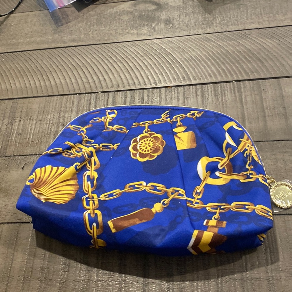 Estée Lauder chain print royal blue makeup bag